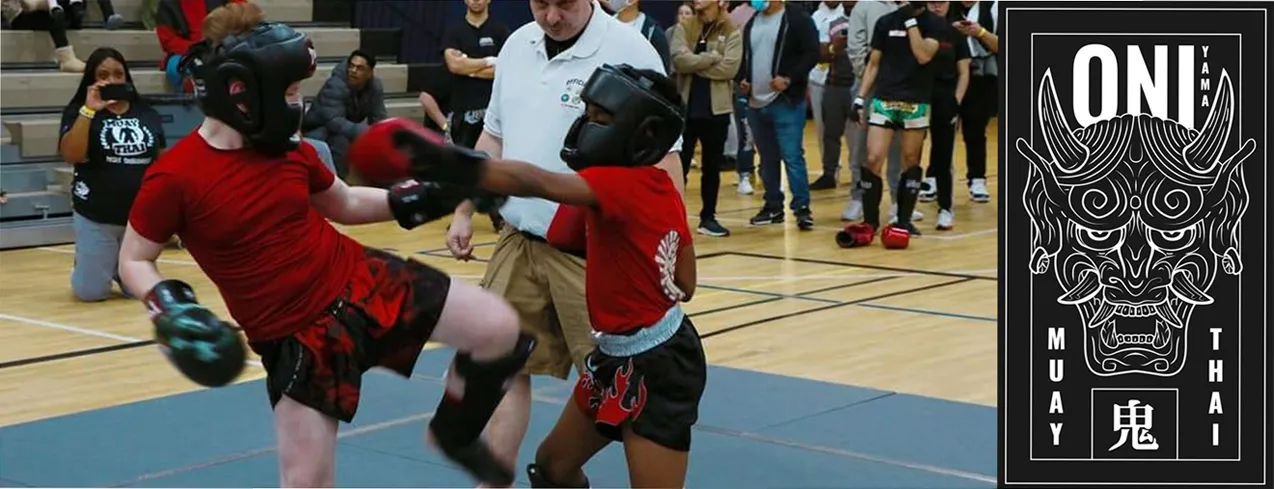 Team Outlaw Muay Thai Tournament Photo with Logo